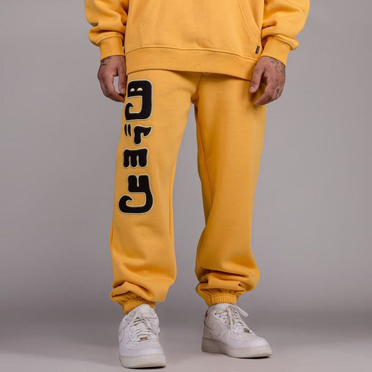 Grimey Wear Lust Mantra Sweatpants Yellow