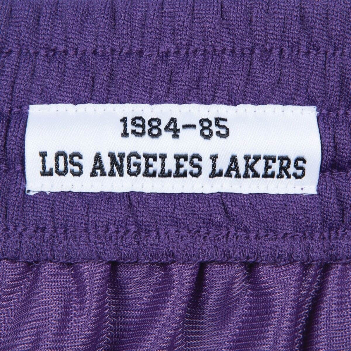 Basketbalové šortky Mitchell & Ness NBA Swingman Road Shorts Lakers 84-85 Los Angeles Lakers fialové