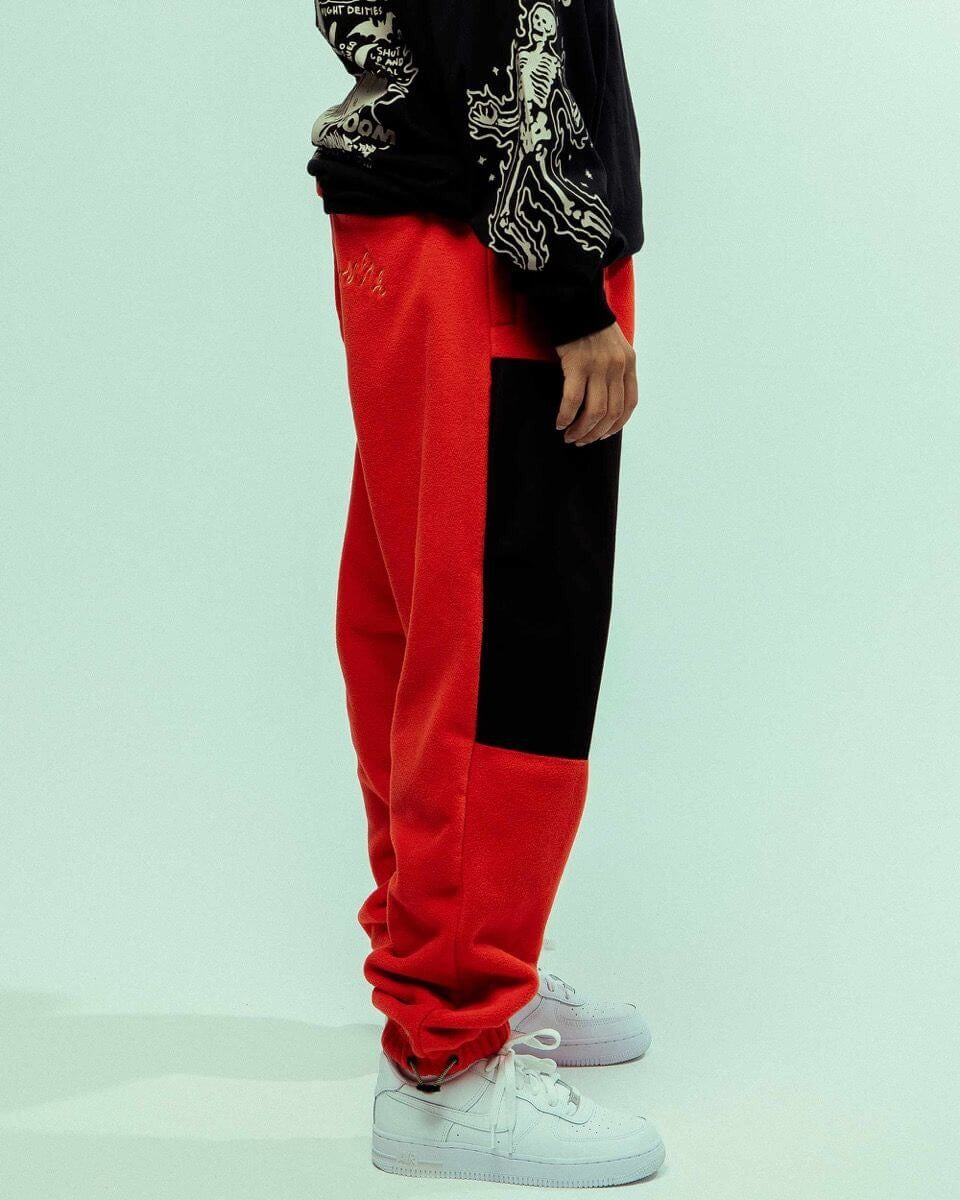 GRIMEY WEAR BACK AT YOU POLAR FLEECE TRACK PANTS RED